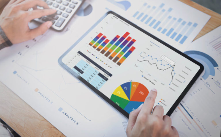 businesswoman-using-tablet-analysis-graph-company