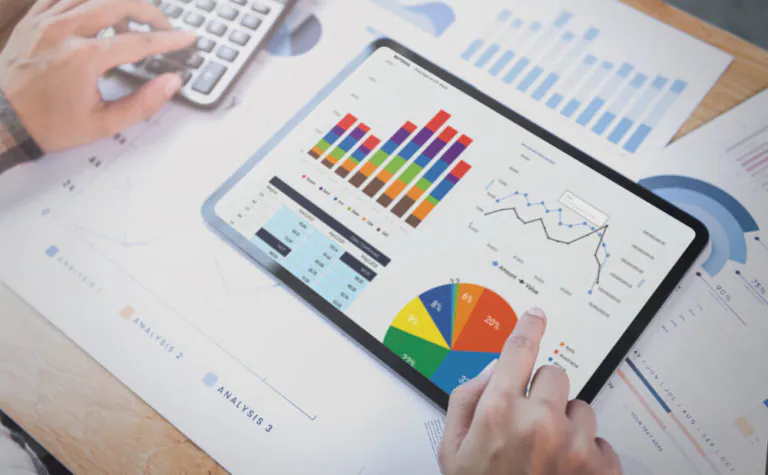 businesswoman-using-tablet-analysis-graph-company